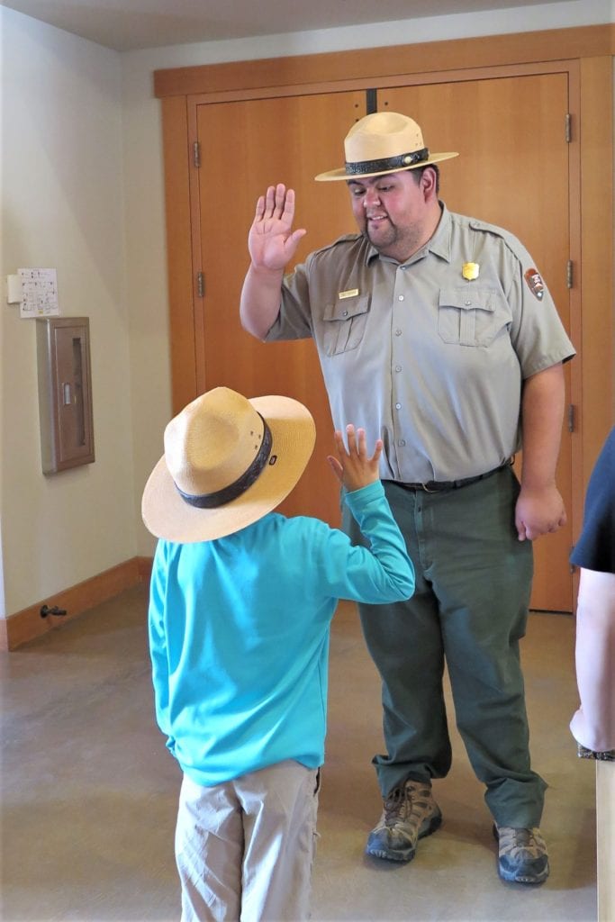 Being Sworn in for a Junior Ranger Badge by a Park Ranger - Top thing to do with kids while traveling in the United States at National Parks