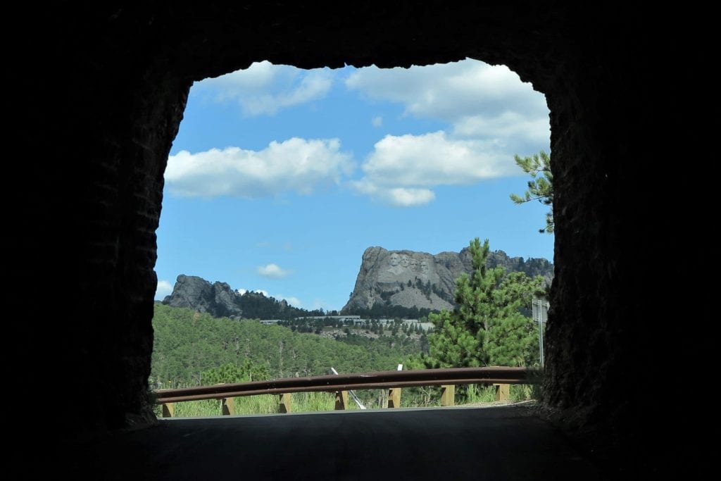 Mount Rushmore view from Iron Mountain Road, looking through the tunnel