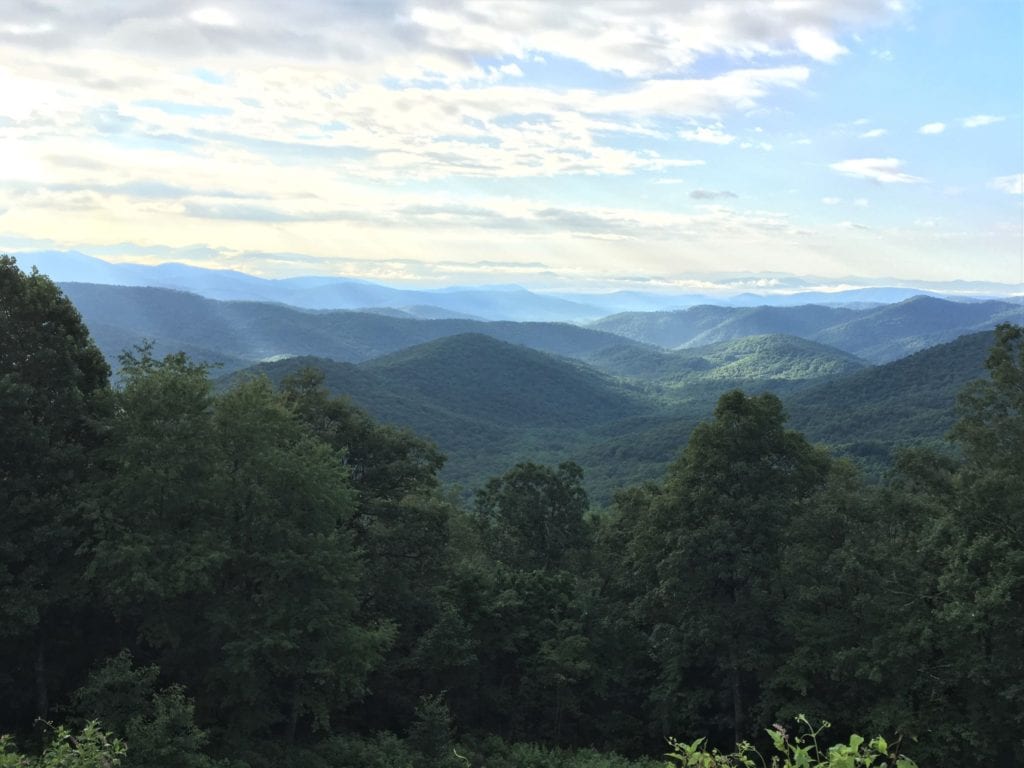 Rays of light shine across the Blue Ridge Mountains, North Carolina