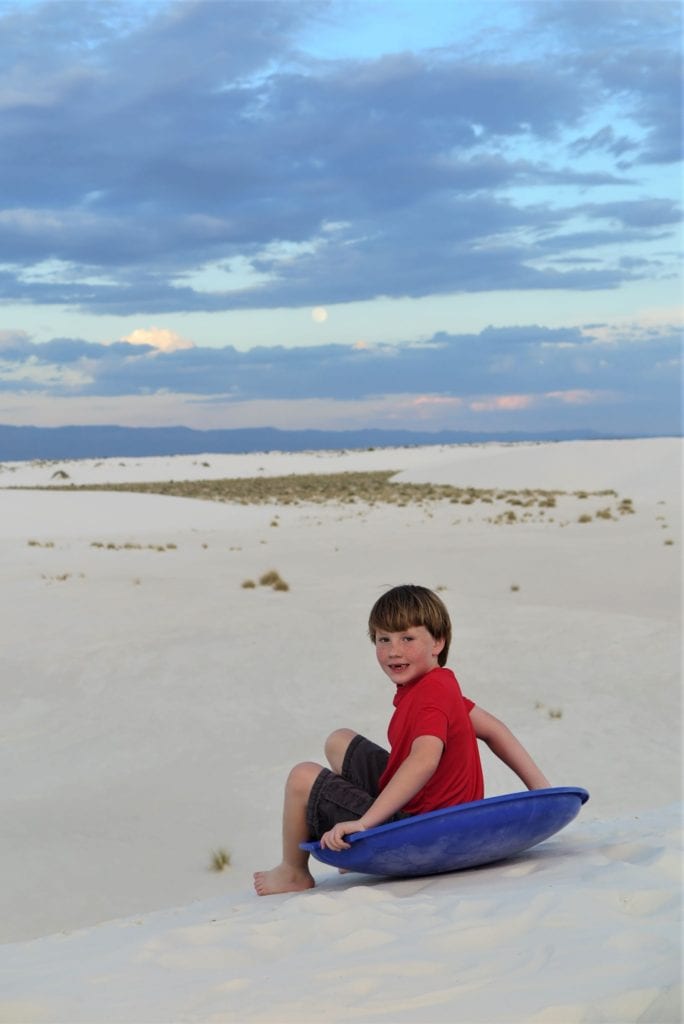 Sledding at White Sands, New Mexico