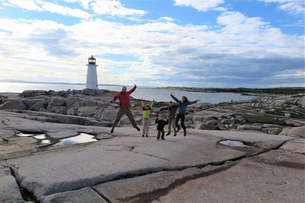 Jumping at Peggy's Cove, Nova Scotia - Great photo ideas