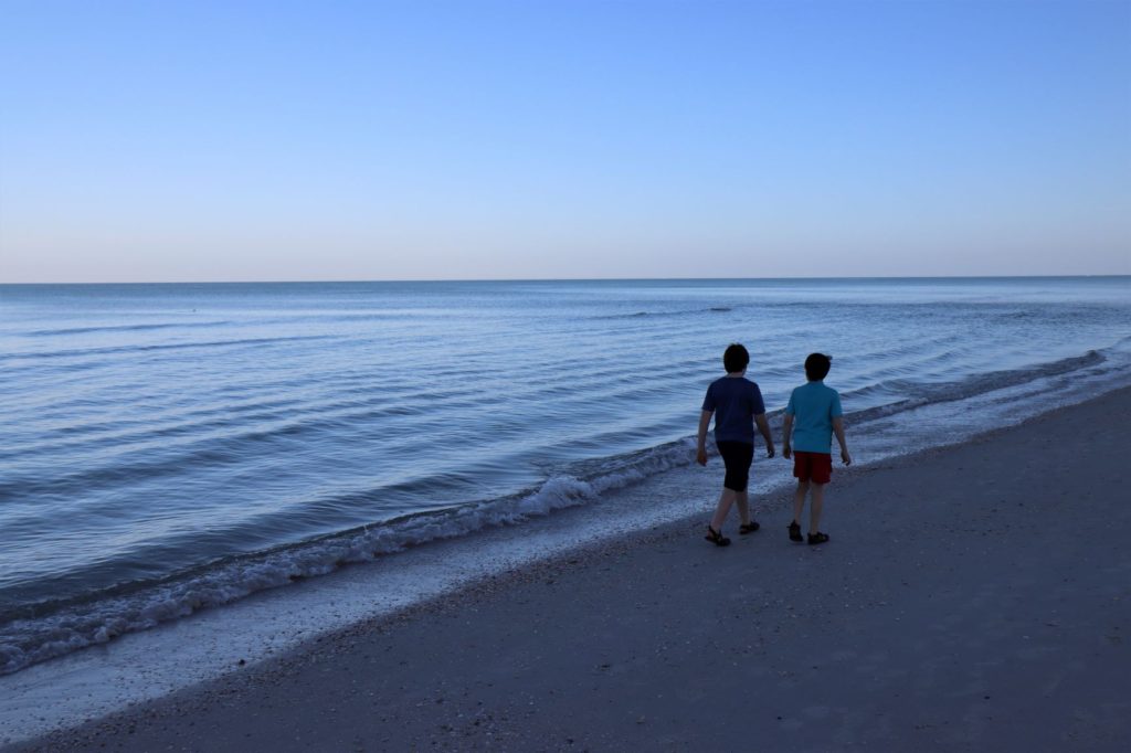 Walking to Caladesi Island from Clearwater Beach, Florida in the early morning