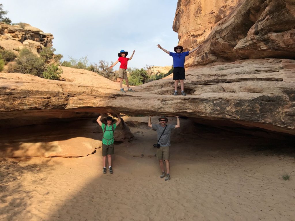 Hickman Bridge Trail - Fun Picture idea holding up this arch - Top Family Trail in Capitol Reef National Park, Utah