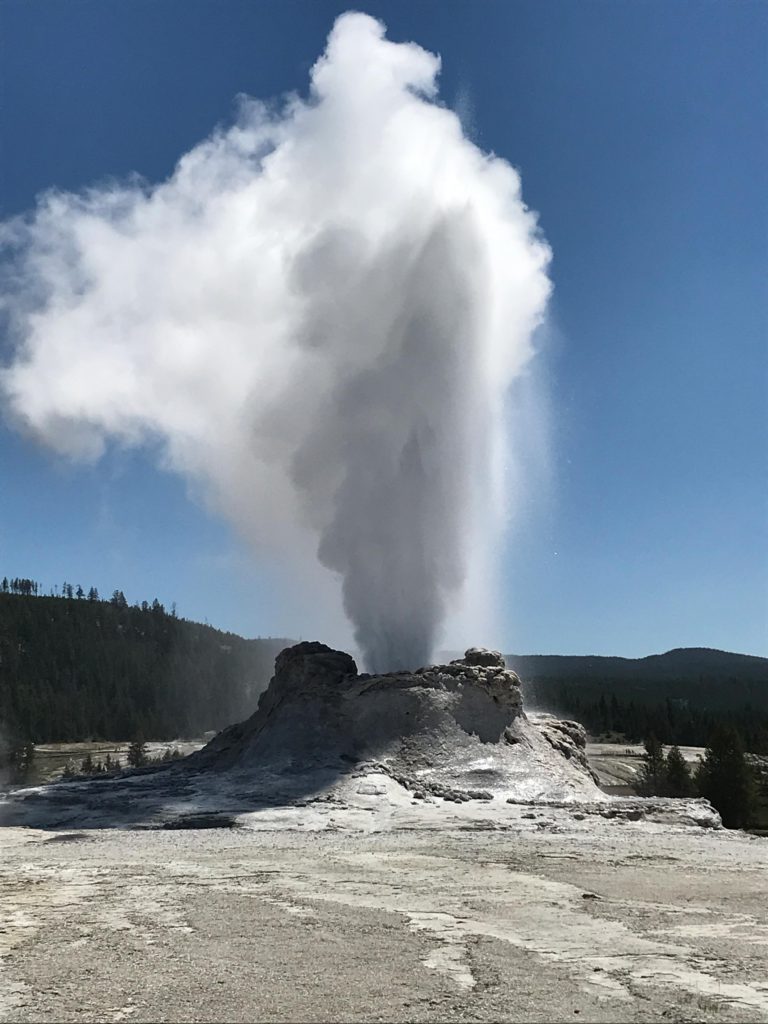 Castle Geyser erupting - Yellowstone itinerary - Wyoming