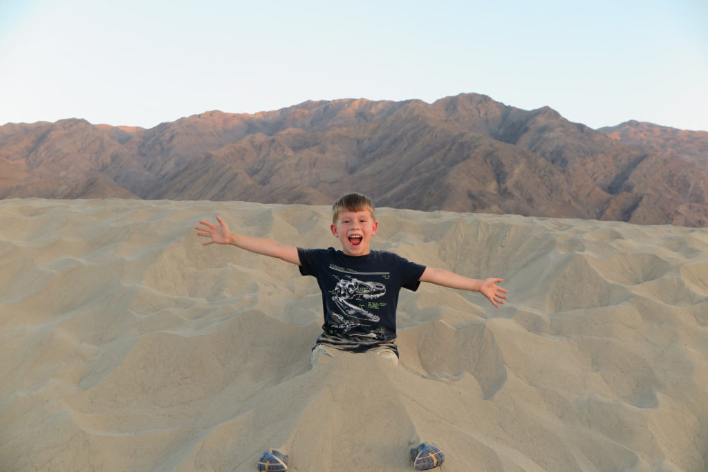 Playing in the sand at Mesquite Sand Dunes, Death Valley - California